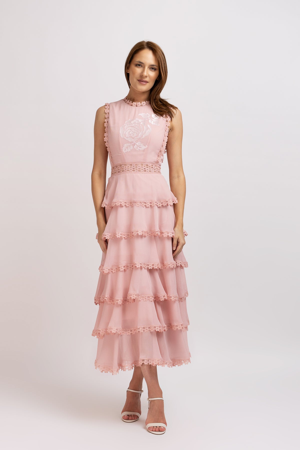 Pink dress made of viscose with ruffles and floral lace