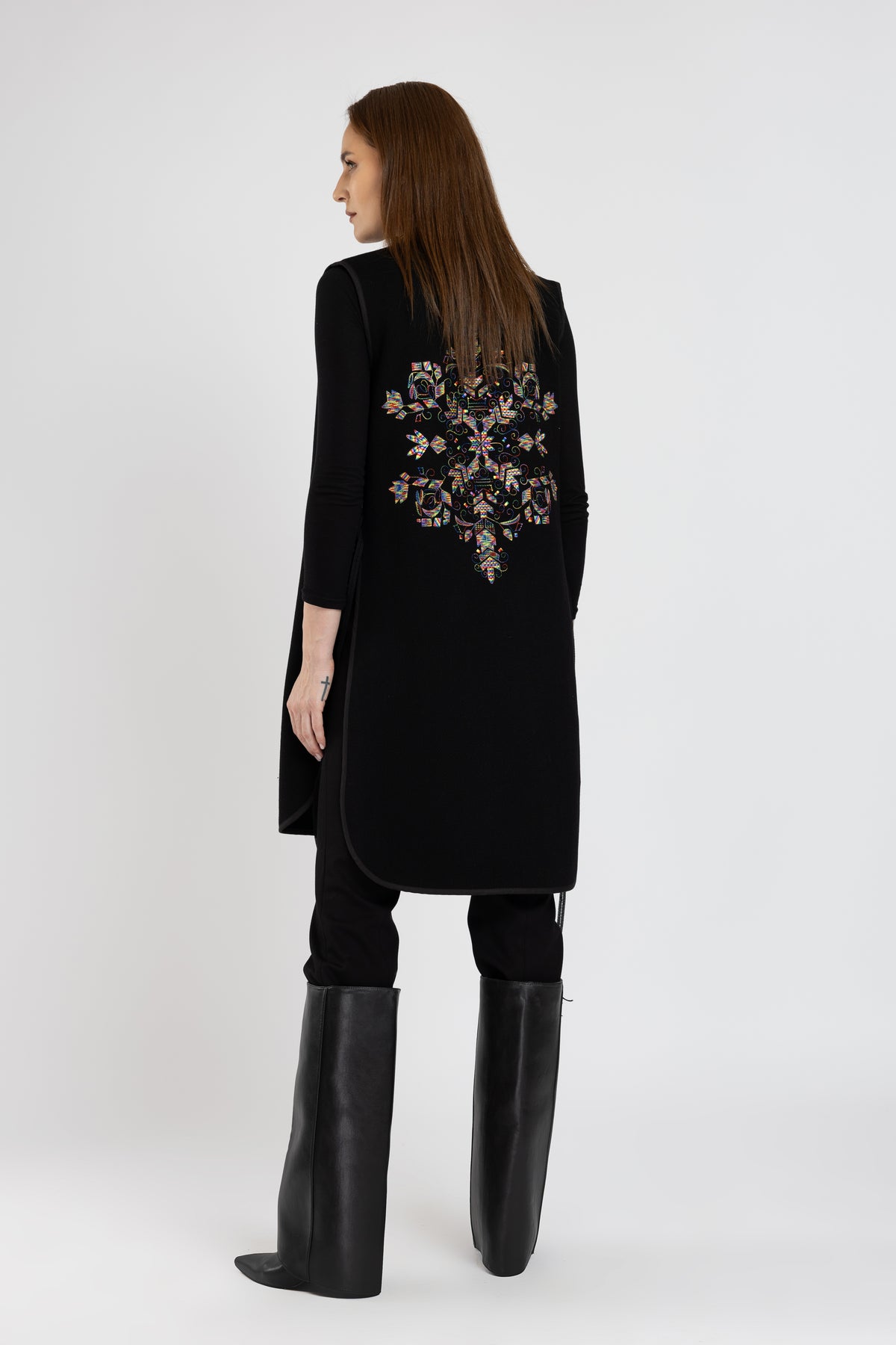Black woolen midi vest with multicolored floral embroidery and stripes on the side