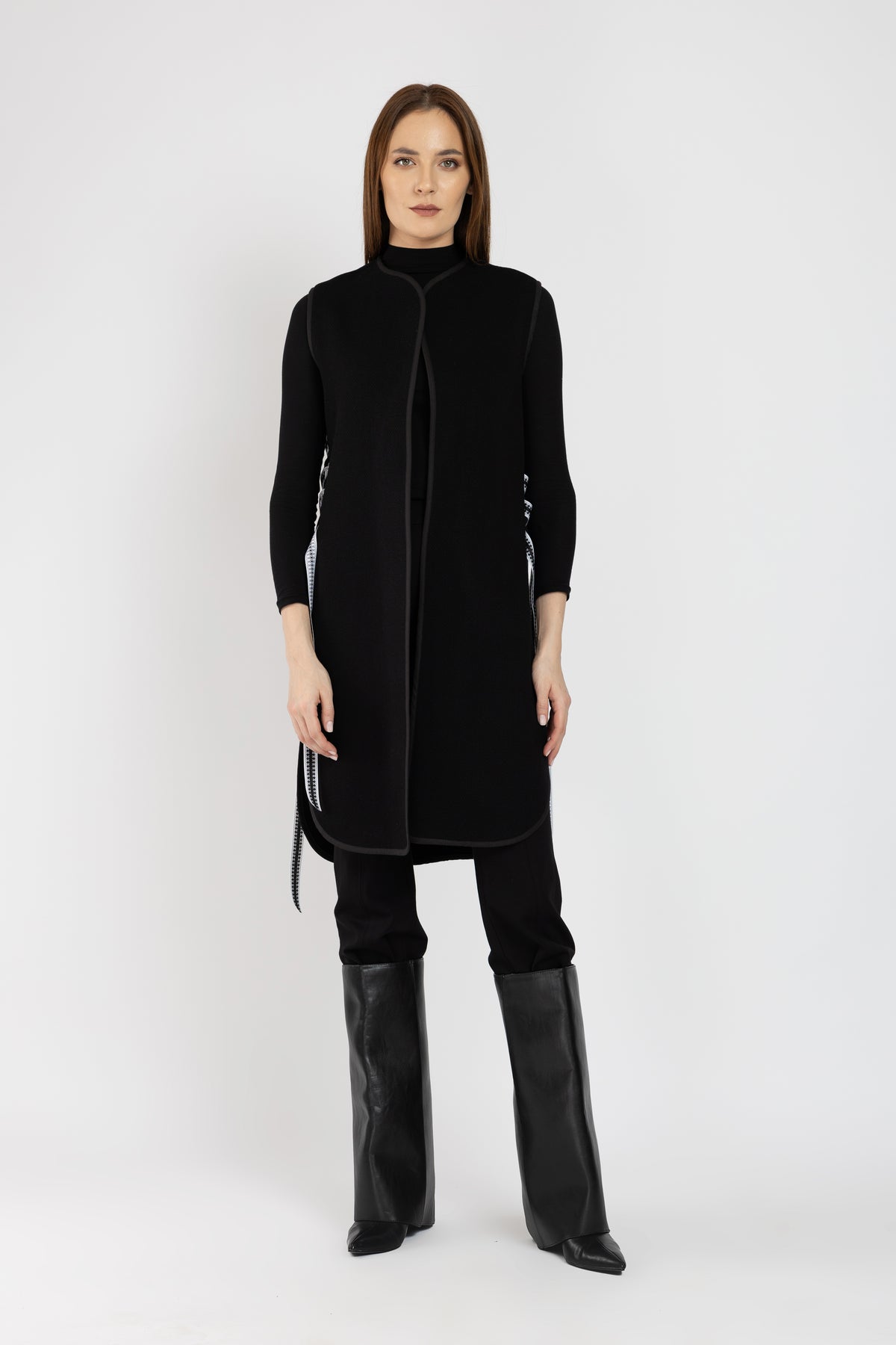 Black woolen midi vest with white floral embroidery and stripes on the side