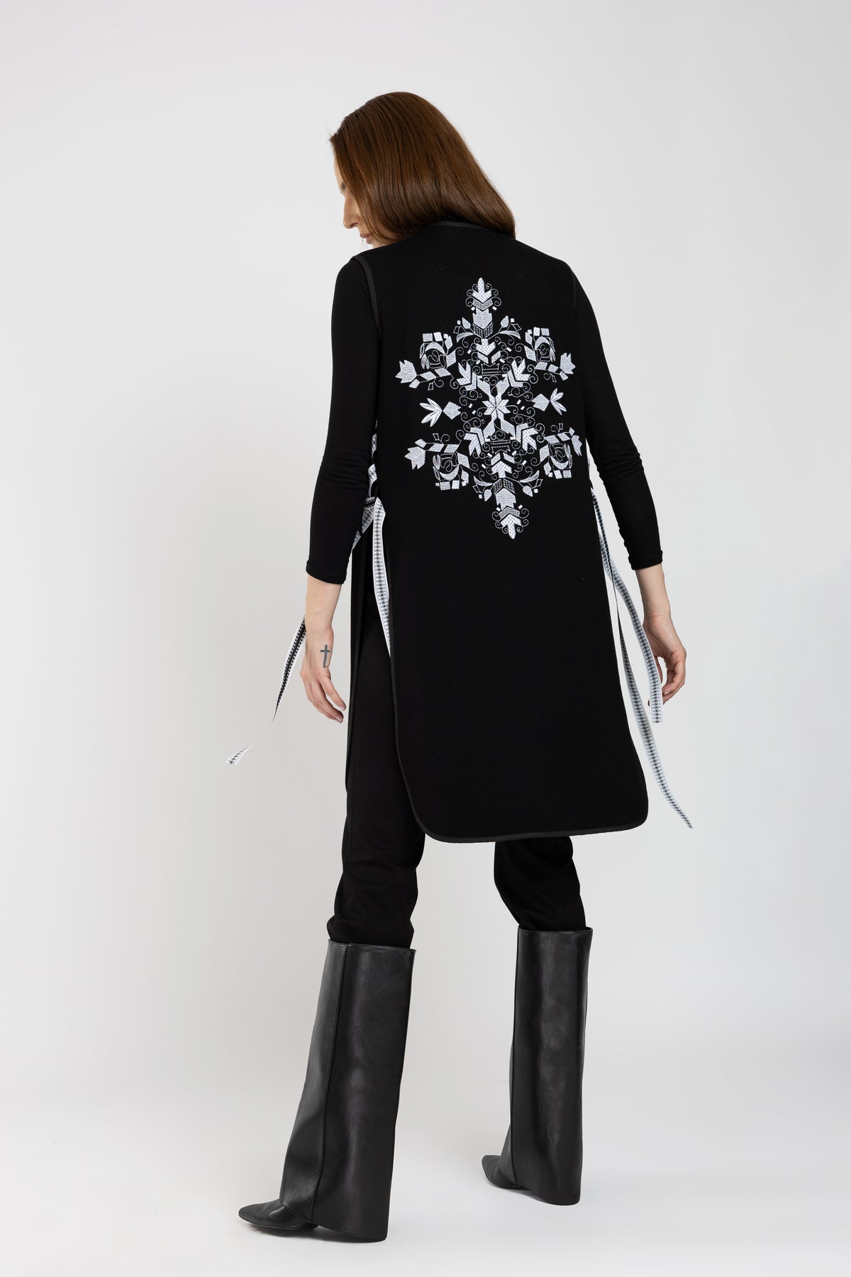 Black woolen midi vest with white floral embroidery and stripes on the side