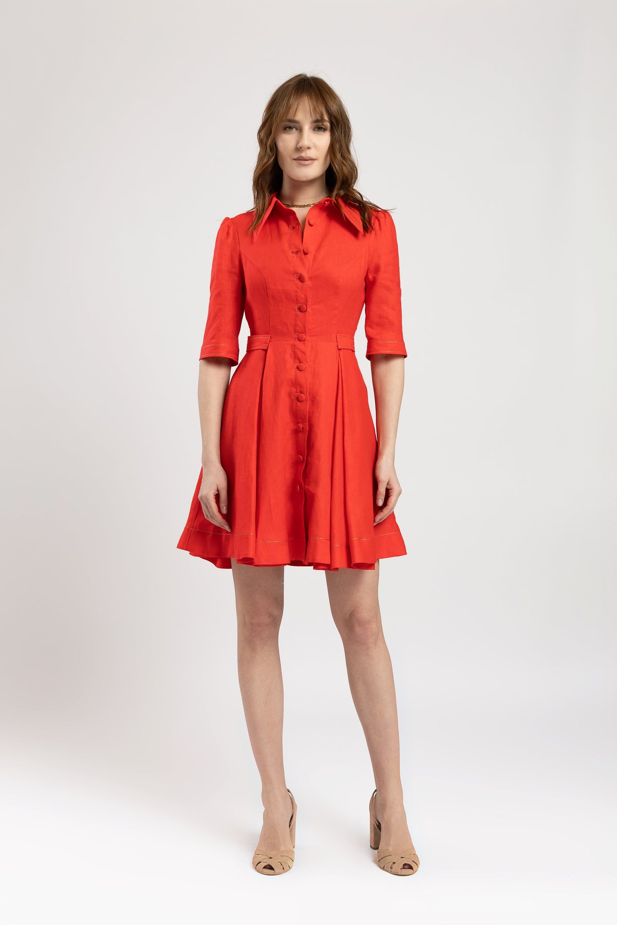 Short dress in vibrant red linen with metallic stitching