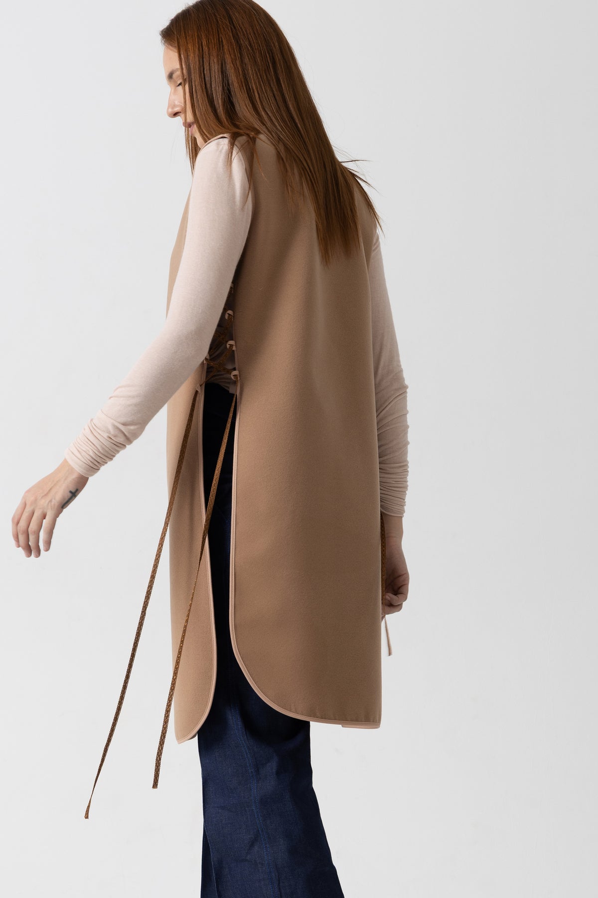 Black woolen midi vest with drawstrings on the sides