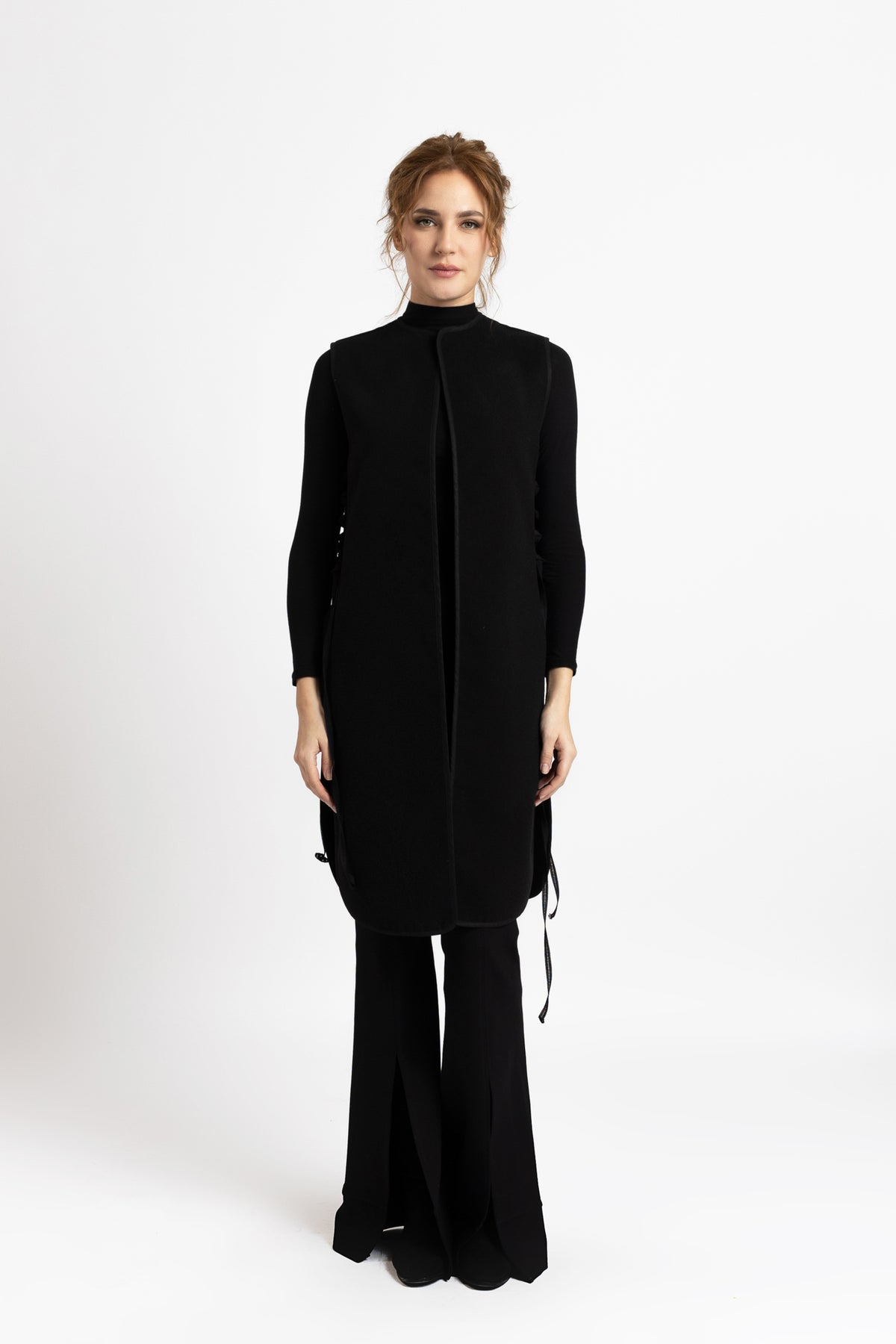 Black woolen midi vest with drawstrings on the sides