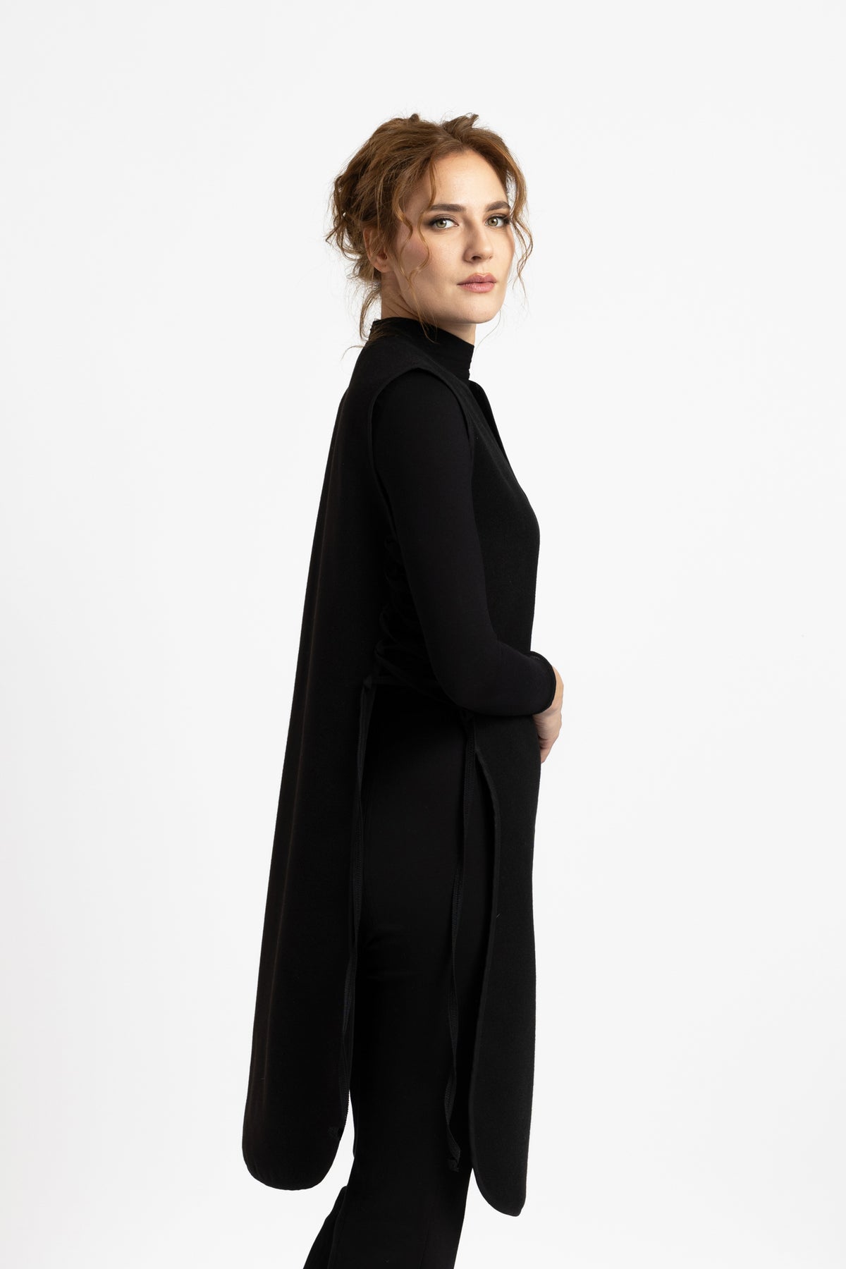 Black woolen midi vest with drawstrings on the sides