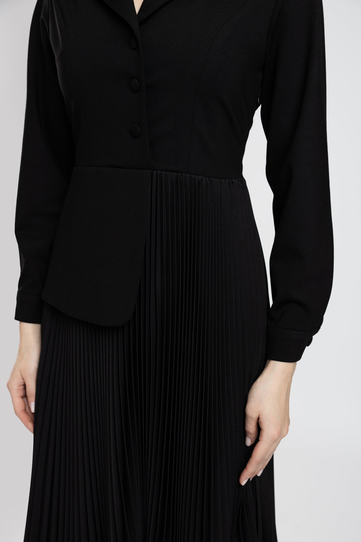 Black jersey dress and black pleated skirt