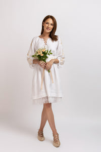 White linen type dress with computerized embroidery