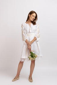 White linen type dress with computerized embroidery