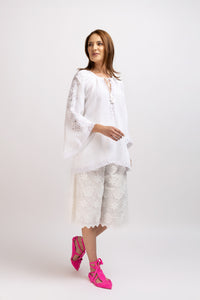 White linen type dress with computerized embroidery