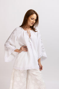 White linen type dress with computerized embroidery