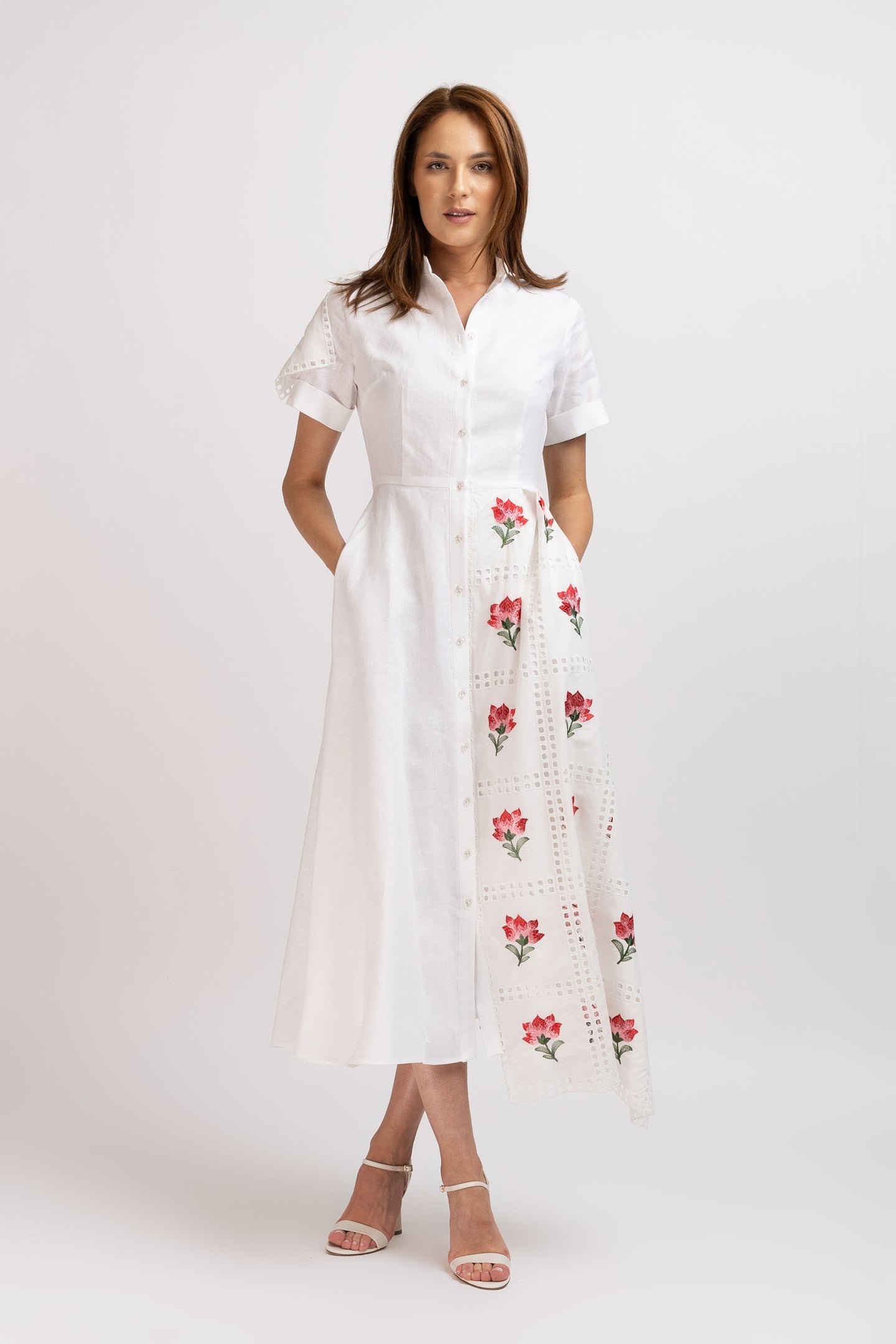 White cotton shirt dress with broken embroidery and belt at the waist