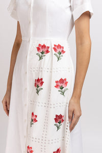 White cotton shirt dress with broken embroidery and belt at the waist