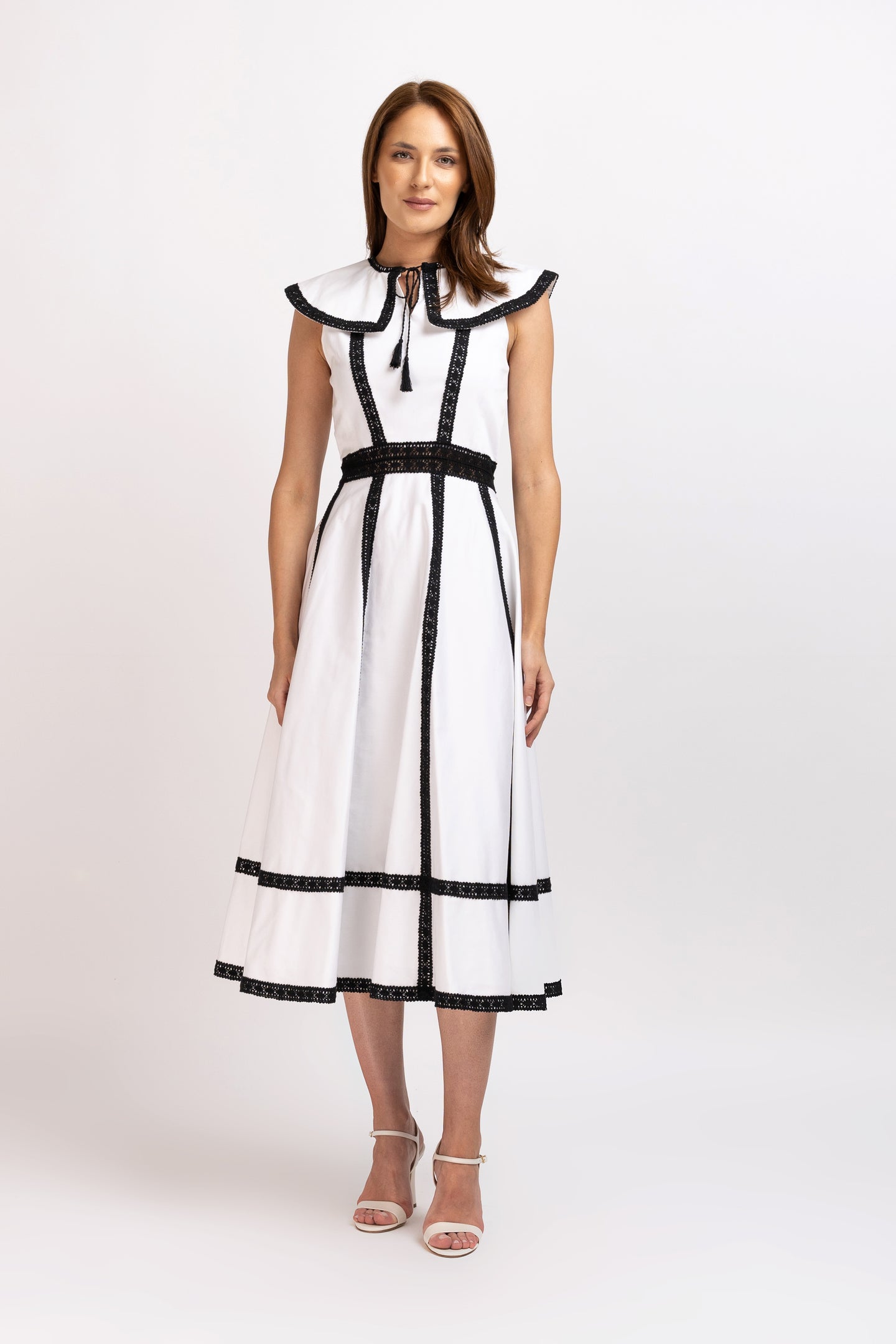 White cotton shirt dress with broken embroidery and belt at the waist