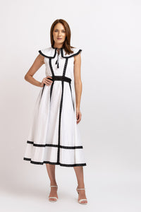 White cotton shirt dress with broken embroidery and belt at the waist