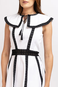 White cotton shirt dress with broken embroidery and belt at the waist