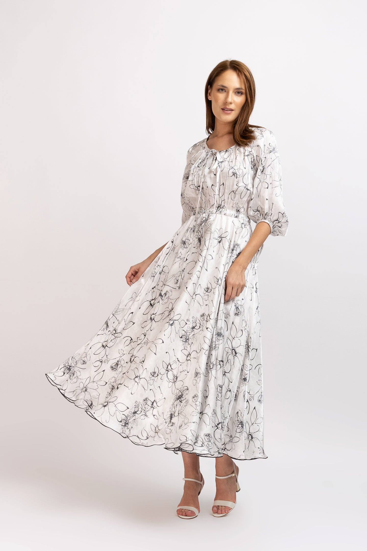 Long dress in vascose with 3/4 sleeves and drawstrings