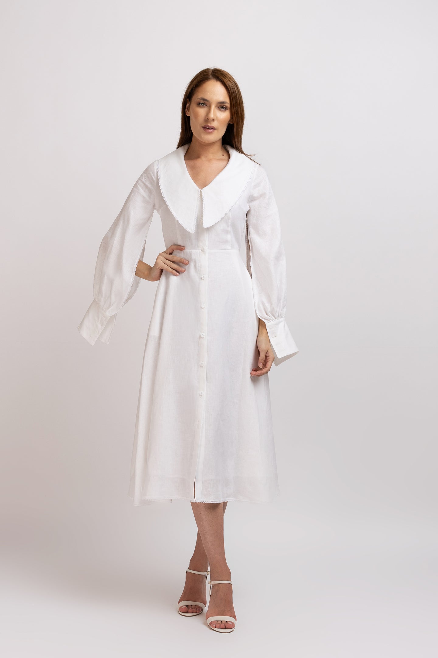 White linen type dress with computerized embroidery