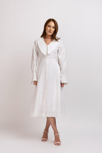 White linen type dress with computerized embroidery