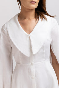 White linen type dress with computerized embroidery