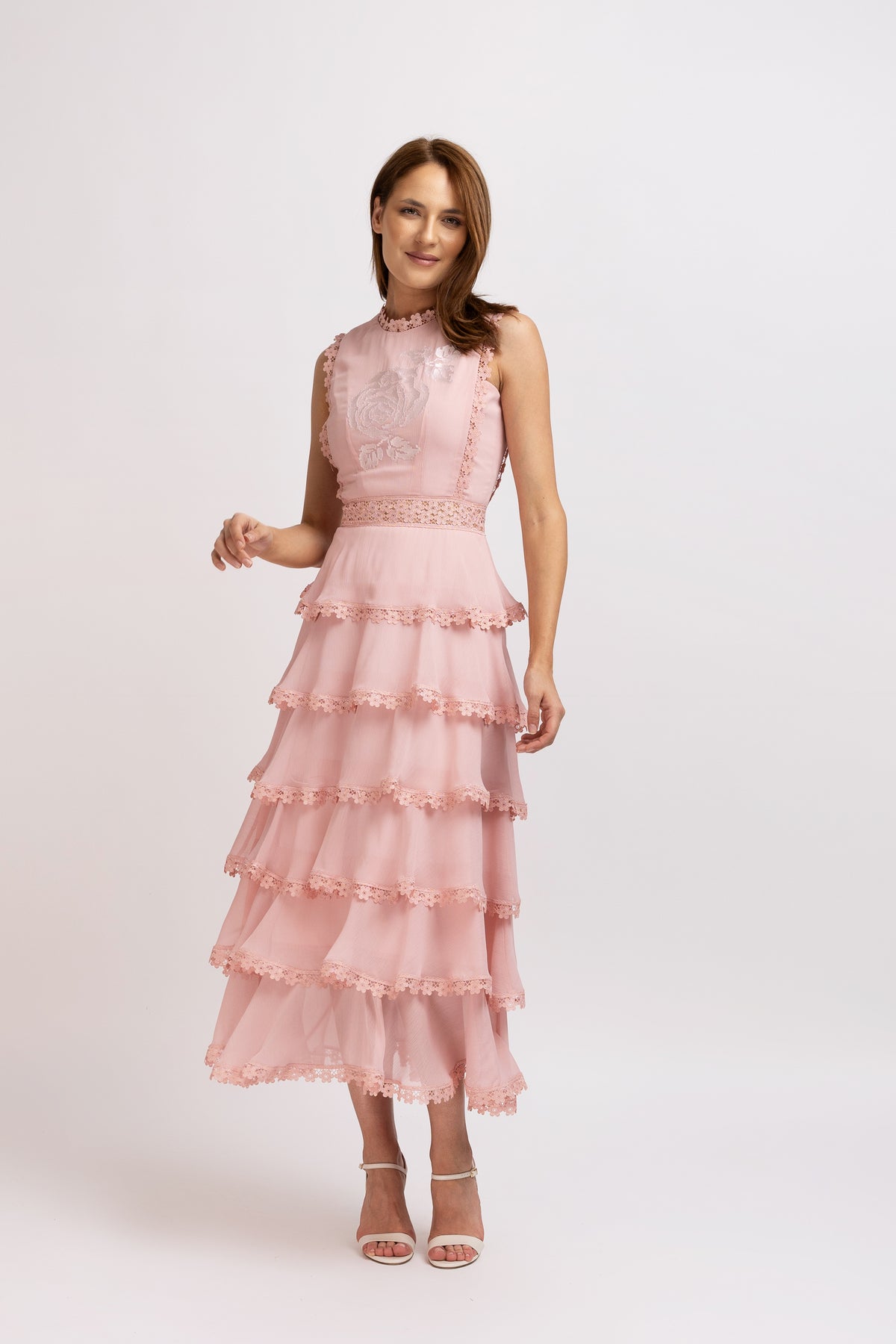 Pink dress made of viscose with ruffles and floral lace 