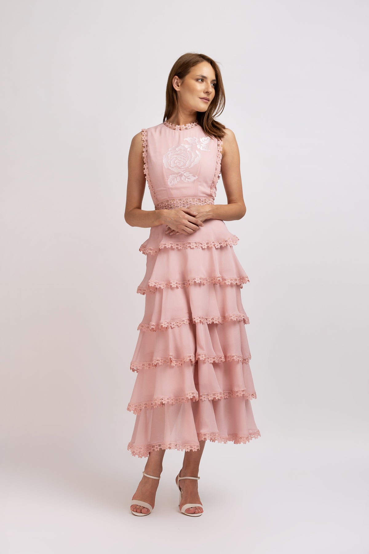 Pink dress made of viscose with ruffles and floral lace 
