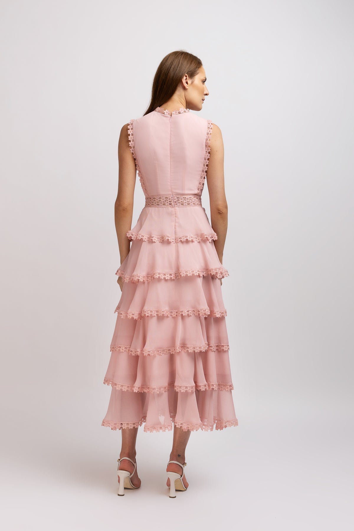Pink dress made of viscose with ruffles and floral lace 