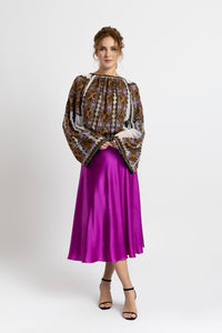 Hand-sewn ie blouse with beads and rich geometric embroidery in earthy and violet tones
