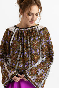 Hand-sewn ie blouse with beads and rich geometric embroidery in earthy and violet tones
