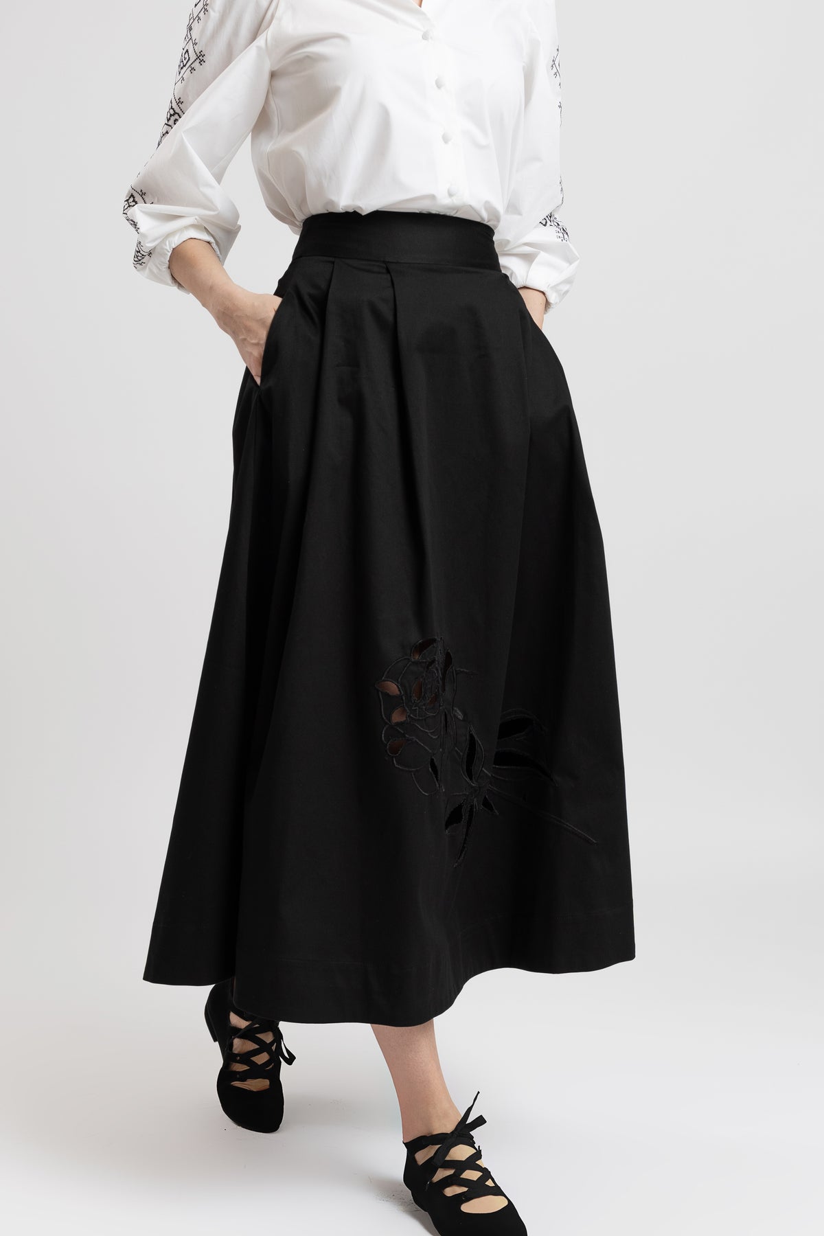 Black cotton midi skirt with embroidered rose