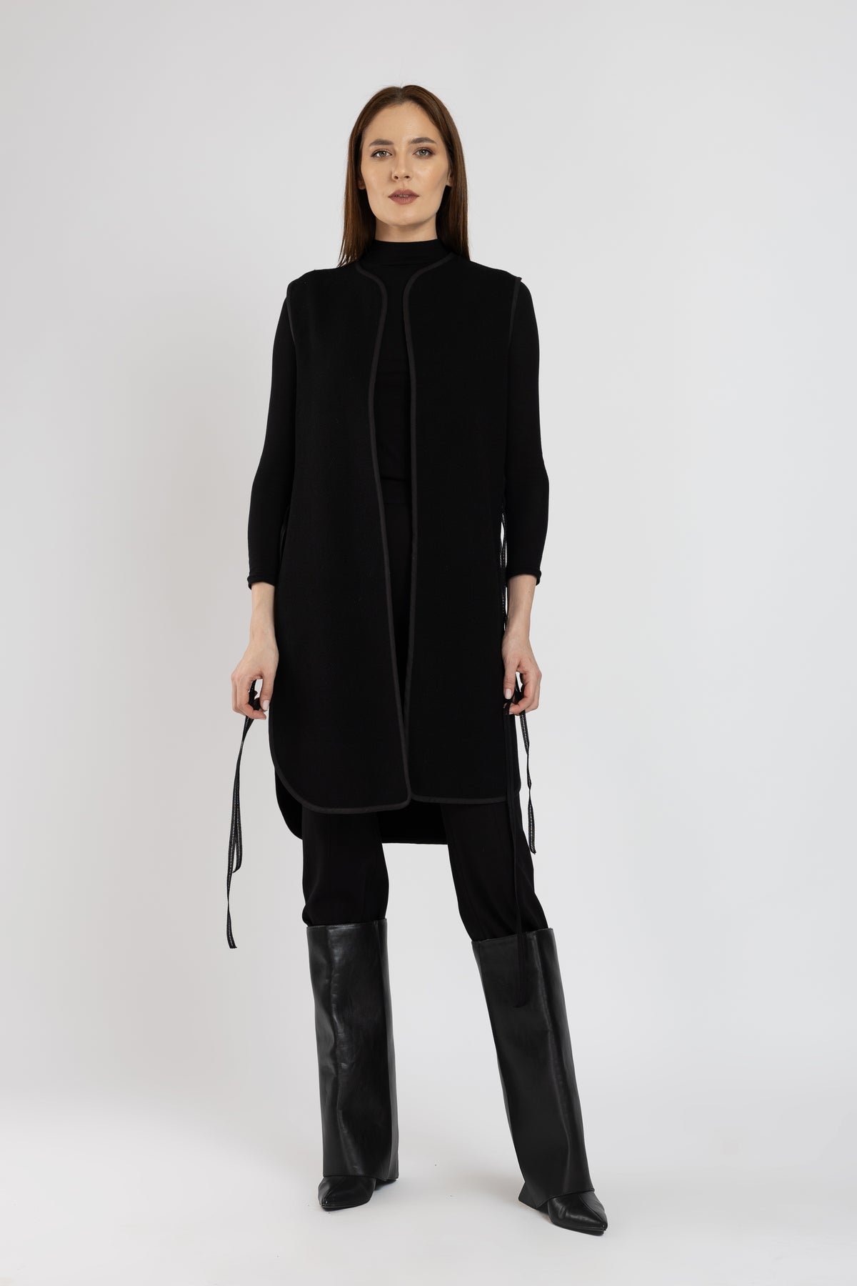 Black woolen midi vest with multicolored floral embroidery and stripes on the side