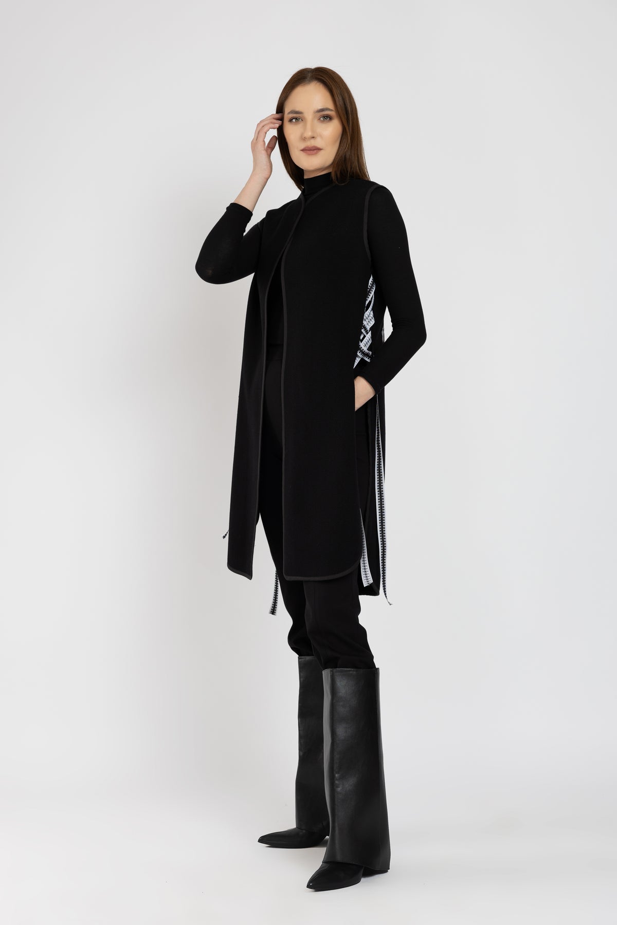 Black woolen midi vest with white floral embroidery and stripes on the side