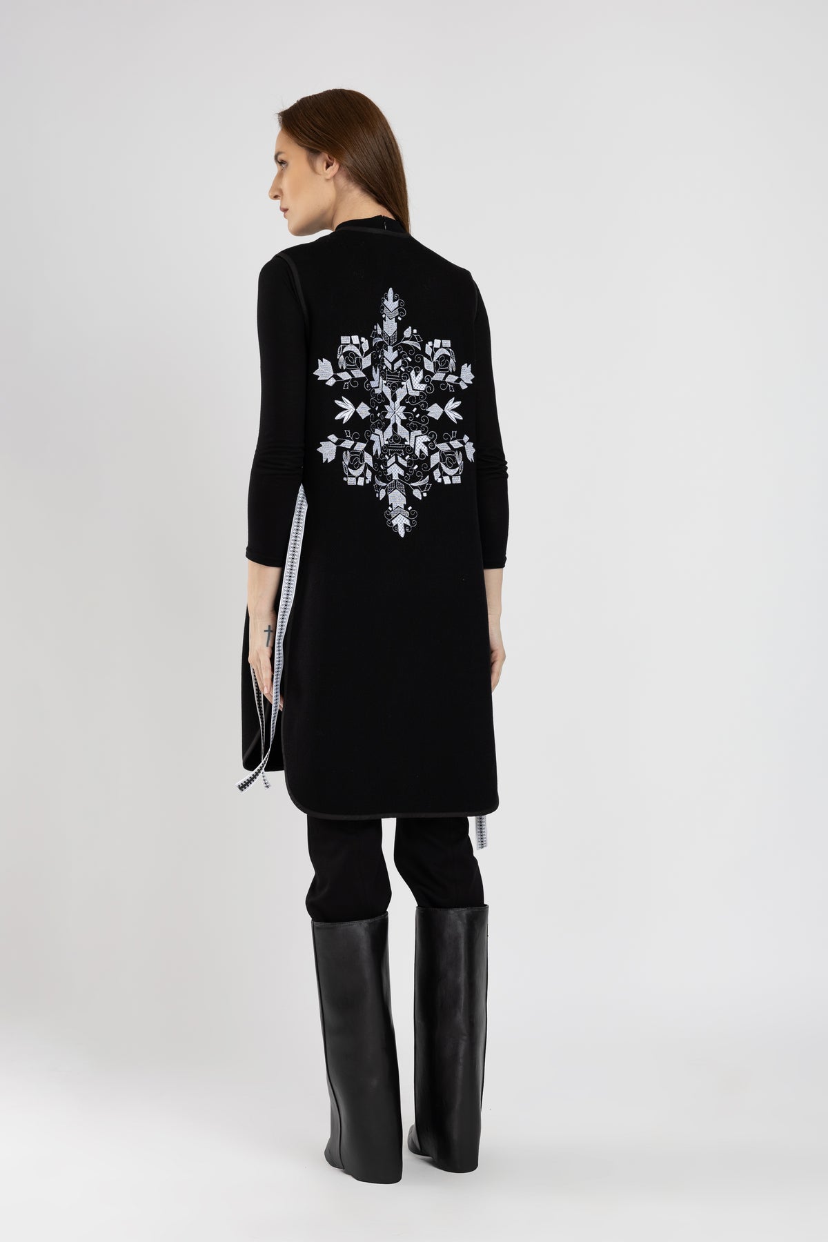 Black woolen midi vest with white floral embroidery and stripes on the side