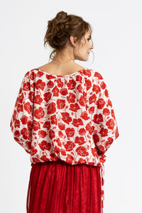 Red printed silk blouse