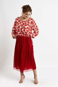 Red printed silk blouse