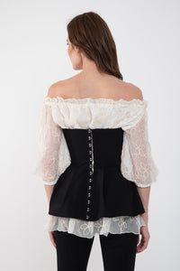 Black jersey corset with ruffles at the waist