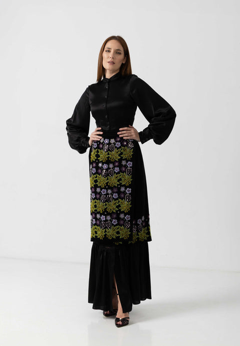 Hand-sewn quilt with multi-colored beads