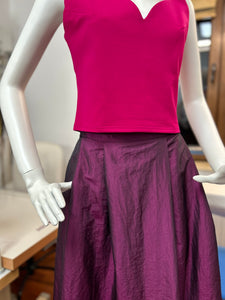 Purple midi skirt with pleats and high waist