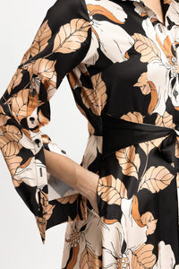 Shirt dress in black satin digitally printed with beige flowers