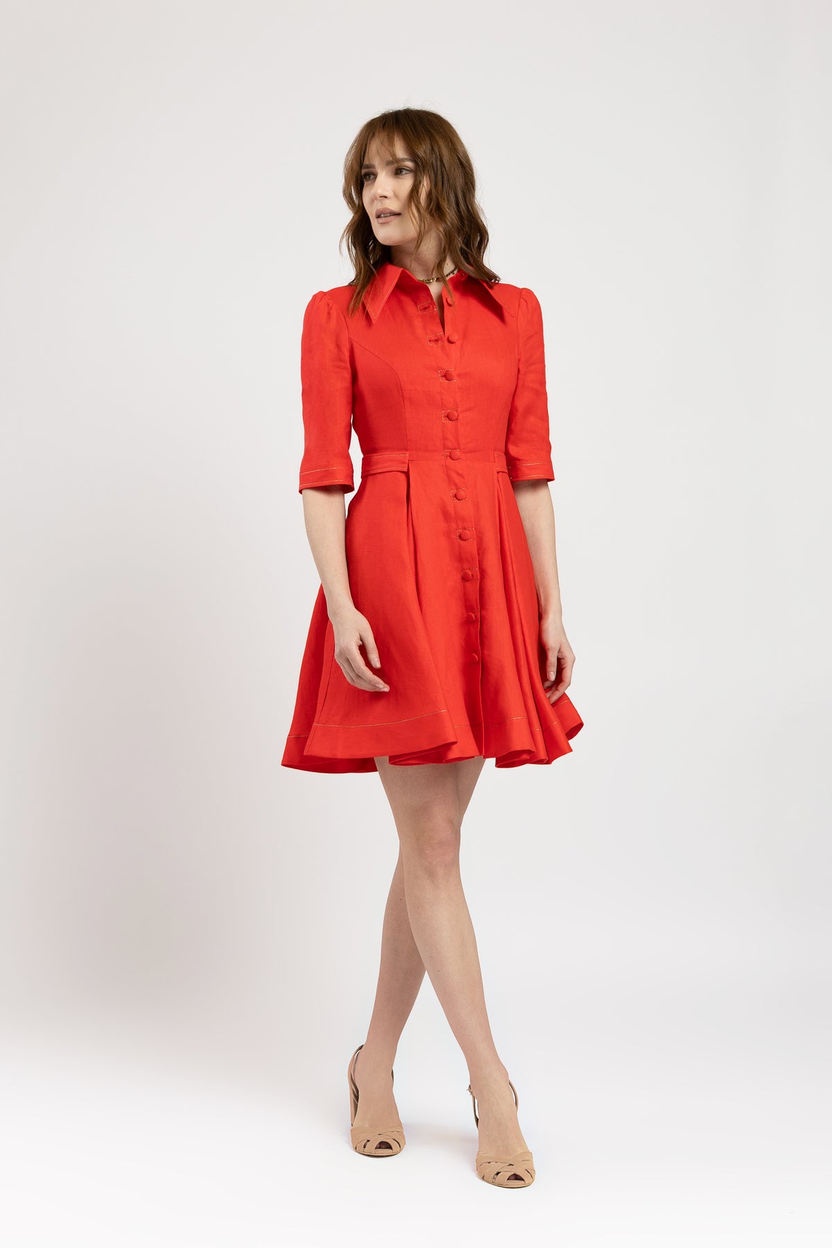 Short dress in vibrant red linen with metallic stitching