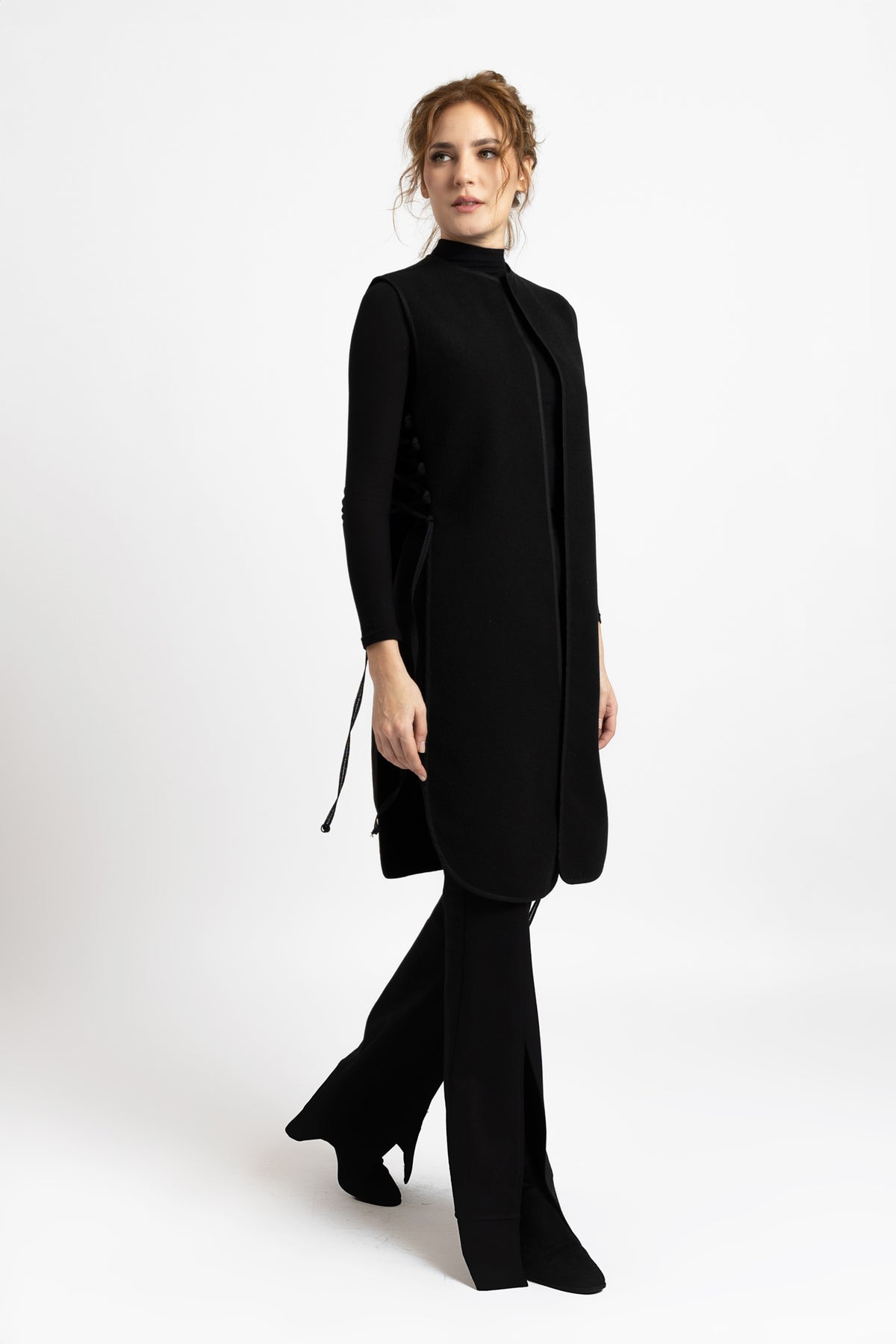 Black woolen midi vest with drawstrings on the sides