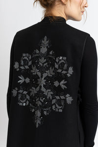 Black woolen midi vest with white floral embroidery and stripes on the side