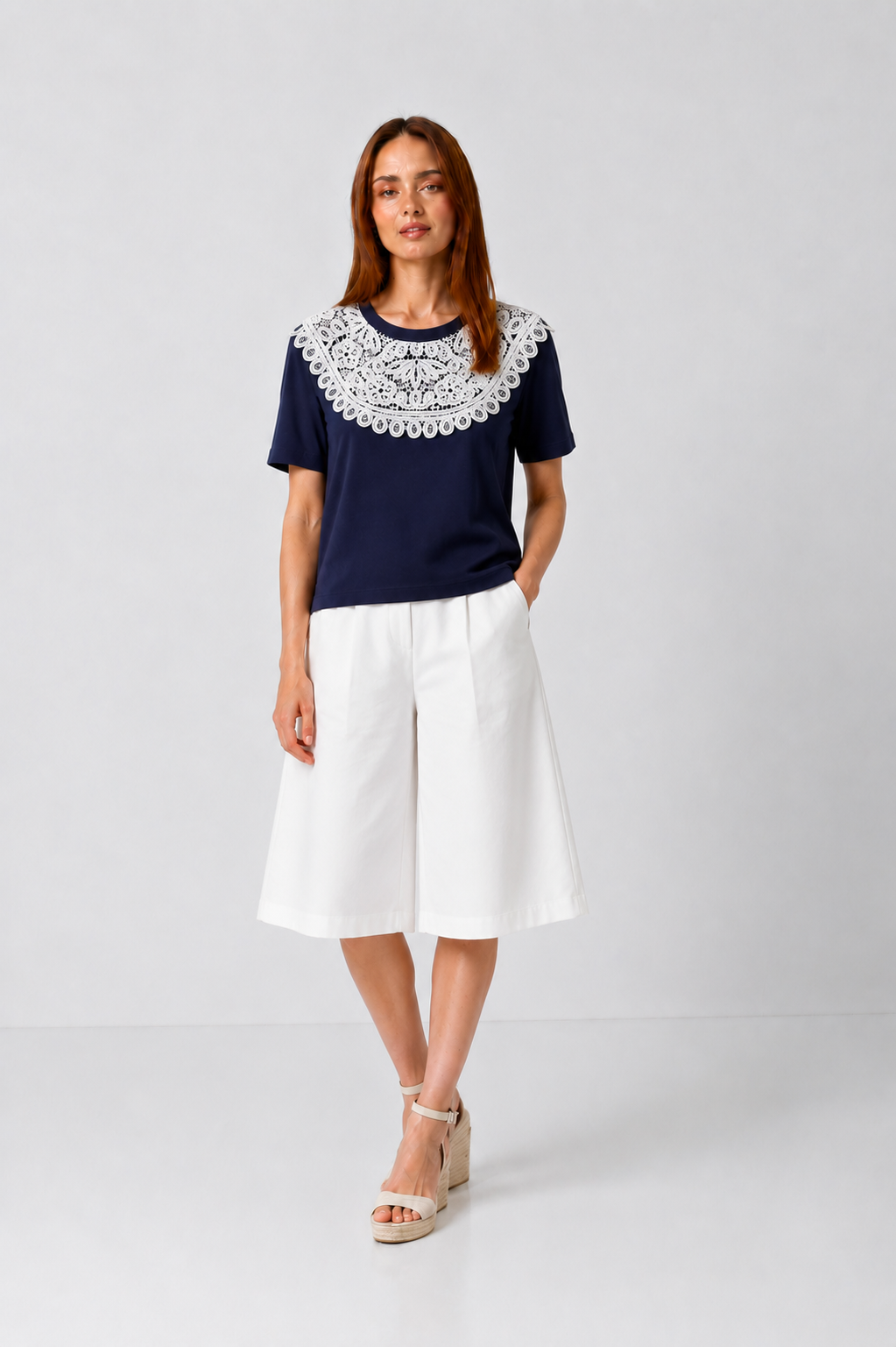 Load image into Gallery viewer, White T-shirt embroidered with the Romanian proverb "A good woman makes as much as a crown"