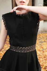 Black viscose dress with frills and embroidered bust