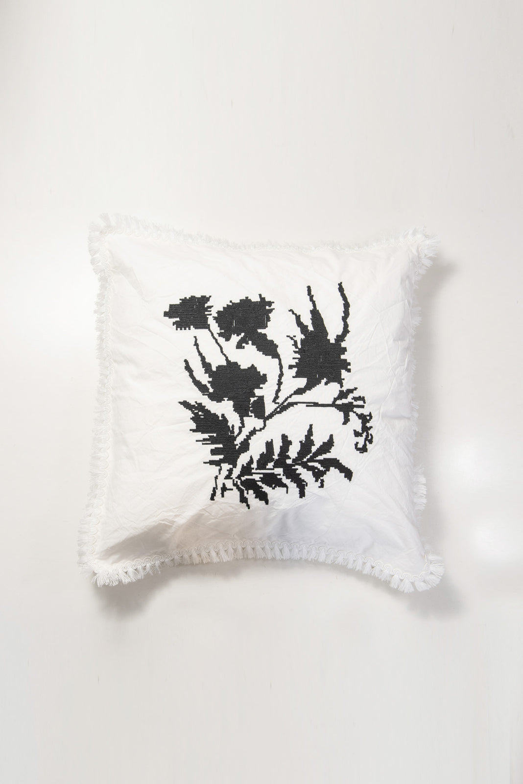 Load image into Gallery viewer, Decorative pillow made of melted canvas with black embroidery