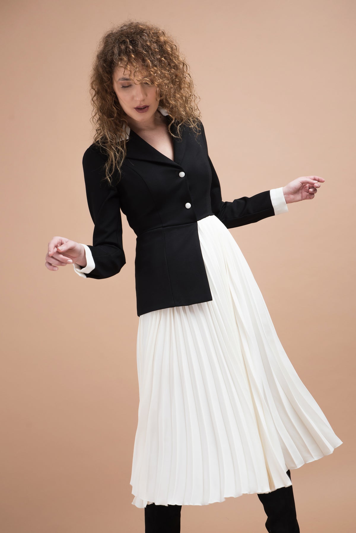 Black jersey dress and white pleated skirt
