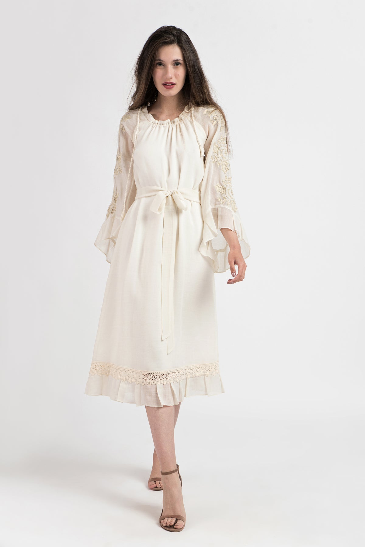 Merino wool dress with computerized embroidery