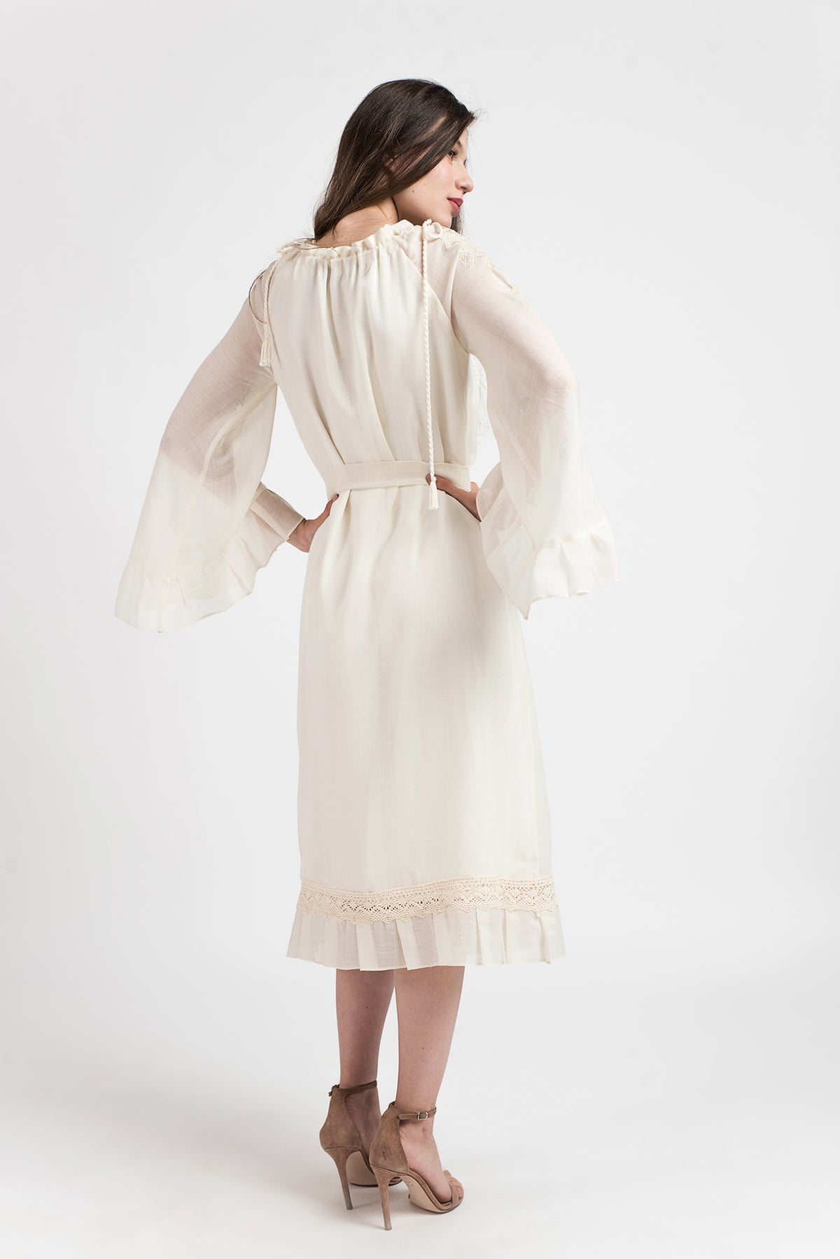 Merino wool dress with computerized embroidery